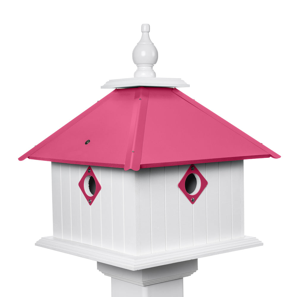 Pink carriage birdhouse with white background