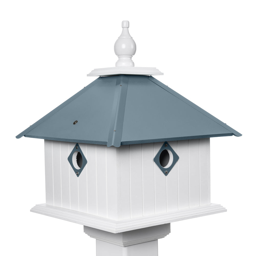 Light blue carriage birdhouse with white background