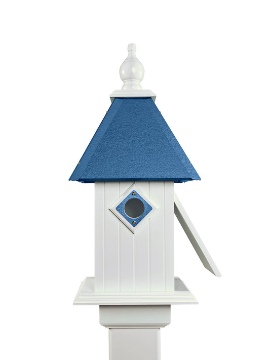 Cobalt blue cathedral birdhouse with white background